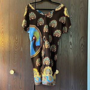 No brand short sleeved black dress with peacock. Size Medium